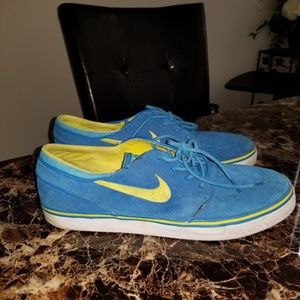 Blue and yellow Nike sneakers